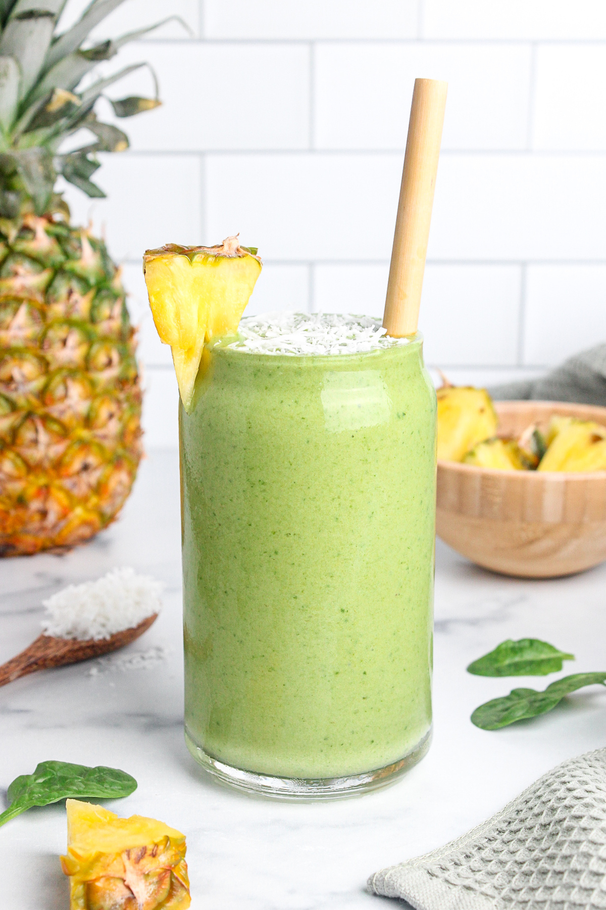 Pineapple protein green smoothie in a glass.