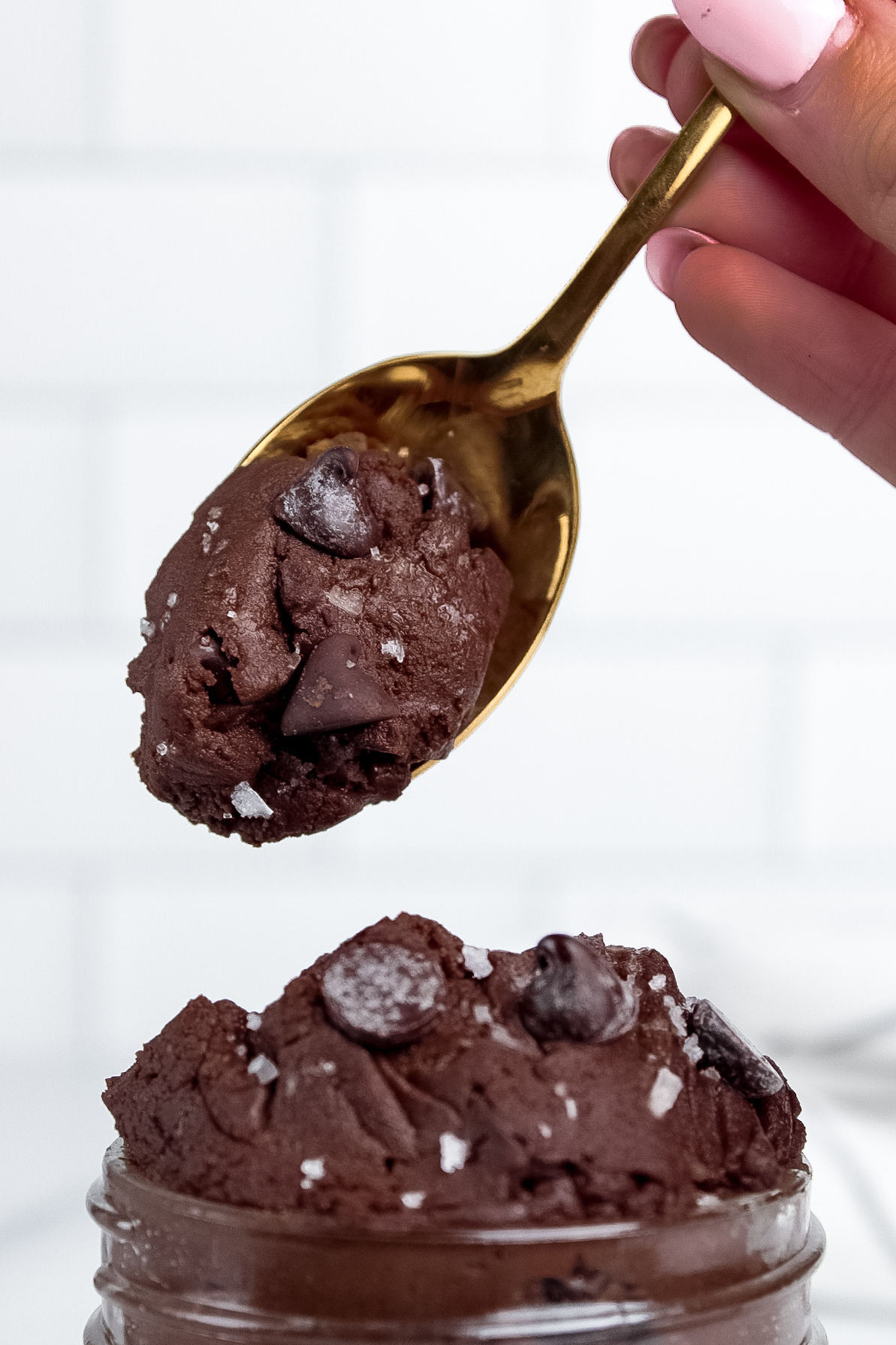 Close-up of a spoonful of protein brownie batter.