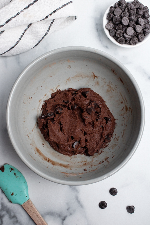 Protein brownie batter with chocolate chips fully mixed in.