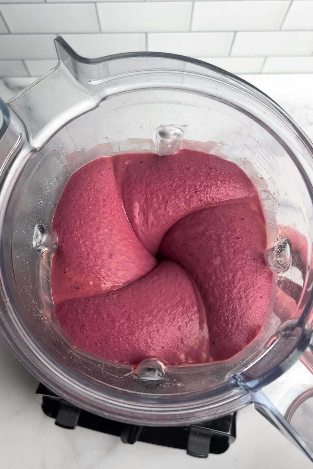 Strawberry banana espresso smoothie blended until thick and creamy in a high-powered blender.